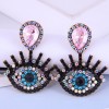 Fashion Metal Flashing Diamond Devils Eye Earrings Wholesale Toppinggoods  Nhsc419957
