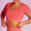 2021 European and American seamless yoga clothes women's sports fitness clothes long sleeve quick drying running high waist hip lifting pants 