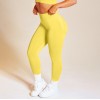 2021 European and American seamless yoga clothes women's sports fitness clothes long sleeve quick drying running high waist hip lifting pants 