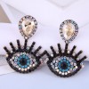 Fashion Metal Flashing Diamond Devils Eye Earrings Wholesale Toppinggoods  Nhsc419957