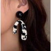 Korean Fashion Irregular Cow Pattern Black And White Color Matching Temperament Earrings Nhsc443326